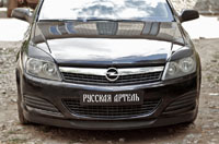 Накладки на передние фары (реснички) Astra универсал 2006-2012 REOA-005100 фото