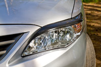 изображение Накладки на передние фары (реснички) Corolla (седан) 2010-2013 кузов 140, 150 рестайлинг RET-080100
